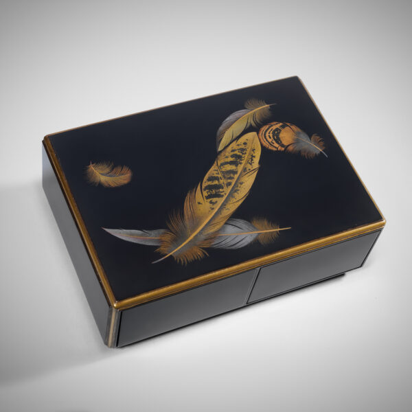 Lacquer box decorated with feathers
